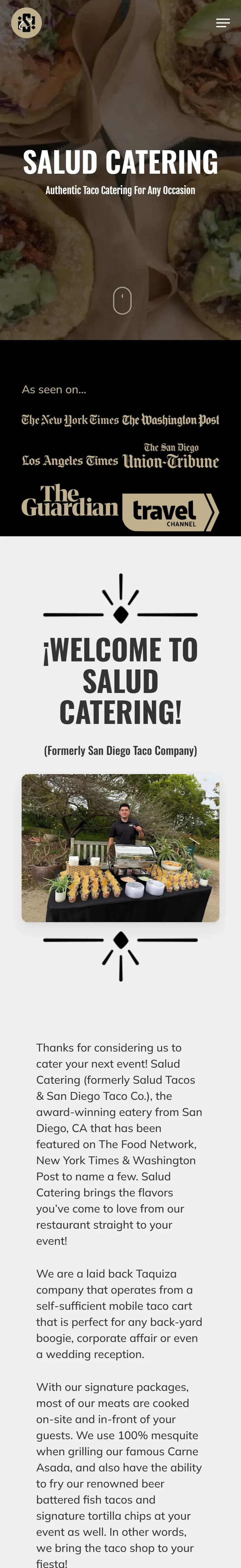 The Salud Catering website on a phone